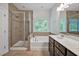 Primary bathroom featuring separate shower, tub, and double vanity with tile flooring at 1434 Salem Dr, Apex, NC 27502