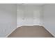 Spare bedroom featuring carpet, two doors and neutral paint at 1434 Salem Dr, Apex, NC 27502