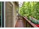 Private deck area offering beautiful views of surrounding trees and nature at 1434 Salem Dr, Apex, NC 27502