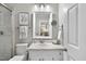 Updated bathroom features a vanity, toilet, and neutral finishes at 1500 Laureldale Dr, Raleigh, NC 27609