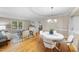 Bright dining room adjacent to the living room, perfect for entertaining guests at 1500 Laureldale Dr, Raleigh, NC 27609