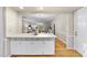 View from kitchen into the dining and living area, great flow for entertaining at 1500 Laureldale Dr, Raleigh, NC 27609