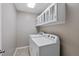 Spacious laundry room with washer, dryer, and plenty of storage at 1500 Laureldale Dr, Raleigh, NC 27609