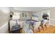 Cozy living space with hardwood floors, modern decor, and bright natural lighting at 1500 Laureldale Dr, Raleigh, NC 27609