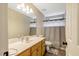 Bright bathroom featuring a tile floor, light fixtures and single sink at 1515 Bradsher Dr, Stem, NC 27581