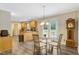 Bright breakfast nook with a view of the backyard at 1515 Bradsher Dr, Stem, NC 27581