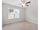 Bright bedroom with a ceiling fan and a window providing natural light and a comfortable atmosphere at 21 Cambridge Dr, Angier, NC 27501