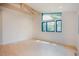 Bright bedroom with large windows, hardwood floors, and exposed wooden beams at 2129 Ridge Rd, Raleigh, NC 27607