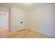 Spacious bedroom with hardwood floors and a closet, offering ample storage and modern design at 2129 Ridge Rd, Raleigh, NC 27607