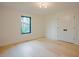 Bright bedroom featuring hardwood floors, a window, and a closet at 2129 Ridge Rd, Raleigh, NC 27607
