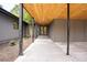 Covered entrance with wood ceiling and modern design elements at 2129 Ridge Rd, Raleigh, NC 27607