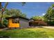 Charming mid-century home with well-maintained lawn and covered parking at 2129 Ridge Rd, Raleigh, NC 27607
