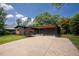 Charming mid-century home with well-maintained lawn and covered parking at 2129 Ridge Rd, Raleigh, NC 27607