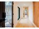 Bright hallway featuring hardwood floors and natural light at 2129 Ridge Rd, Raleigh, NC 27607