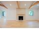 Spacious living room with hardwood floors, fireplace, and natural light at 2129 Ridge Rd, Raleigh, NC 27607
