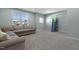 Spacious bonus room with a large window and seating area at 217 Tumbling River Dr, Wendell, NC 27591