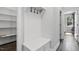 Hallway features a custom mudroom area with bench seating, hooks, and shelving at 217 Tumbling River Dr, Wendell, NC 27591