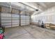 Clean, empty two-car garage providing ample parking and storage space for vehicles and belongings at 217 Tumbling River Dr, Wendell, NC 27591