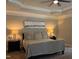 Comfortable main bedroom suite featuring neutral decor, recessed lighting, and plush bedding at 2725 Belmont View Loop, Cary, NC 27519