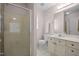 A bright bathroom featuring a shower, toilet, and vanity with sink at 3000 Hidden Spring Ln, Oxford, NC 27565