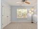 Bedroom includes a ceiling fan, carpet, a window, and closet at 3021 Winding Waters Way, Raleigh, NC 27614