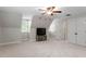 Large bonus room with carpet flooring, closet and windows for natural light at 3025 Bentwillow Dr, Fuquay Varina, NC 27526