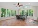 Sunlit breakfast nook with windows offering stunning views of the backyard at 3025 Bentwillow Dr, Fuquay Varina, NC 27526