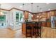 Beautiful kitchen with custom cabinetry, stainless steel appliances, and a breakfast bar for casual dining at 3025 Bentwillow Dr, Fuquay Varina, NC 27526