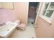 Full bathroom showcasing a sink, toilet, and bathtub/shower combo, ready for renovation to modernize the space at 3204 Friar Tuck Rd Rd, Raleigh, NC 27610
