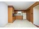 Retro kitchen with dated appliances, cabinets, and flooring, offering vintage charm or renovation potential at 3204 Friar Tuck Rd Rd, Raleigh, NC 27610