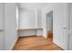 Bright office space featuring a built-in desk, neutral walls, hardwood floors and natural light at 3506 Arthur Minnis Rd, Hillsborough, NC 27278