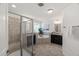 Bathroom featuring a glass shower, granite countertops, and double sinks at 3601 Lily Orchard Way, Apex, NC 27539