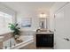 Bright bathroom showcasing soaking tub, granite vanity with large mirror, and decorative accents at 3601 Lily Orchard Way, Apex, NC 27539