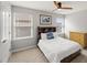 Bedroom featuring carpeted floor, neutral walls, ceiling fan, and natural light at 3601 Lily Orchard Way, Apex, NC 27539