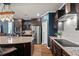 Well-equipped kitchen with granite counters, stainless appliances, and ample storage space at 3601 Lily Orchard Way, Apex, NC 27539