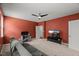 Cozy living room features a desk area, television, and neutral carpet at 3601 Lily Orchard Way, Apex, NC 27539