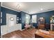 Welcoming living room with hardwood floors and ample natural light, enhanced by stylish decor and cozy seating at 3601 Lily Orchard Way, Apex, NC 27539