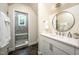 Modern bathroom with glass shower, sleek vanity, and elegant fixtures at 429 Carolina Cir, Durham, NC 27707