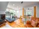 Bonus room with workout area featuring modern gym equipment and multiple windows at 429 Carolina Cir, Durham, NC 27707