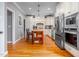 Spacious kitchen with stainless steel appliances and custom cabinets at 429 Carolina Cir, Durham, NC 27707