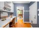 Comfortable home office space with built-in shelves and desk at 429 Carolina Cir, Durham, NC 27707