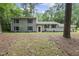 Inviting two-story home with a lush lawn and mature trees offering shade and privacy at 4301 Azalea Dr, Raleigh, NC 27612