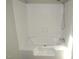 Inviting white bathtub with jets and shower head, ready for relaxation at 440 Montgomery Rd, Franklinton, NC 27525
