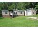 Charming home exterior with garage and well-maintained lawn at 440 Montgomery Rd, Franklinton, NC 27525