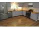 Well-lit kitchen features stainless appliances, butcher block countertops, and ample cabinet space for storage at 440 Montgomery Rd, Franklinton, NC 27525