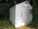 Shed exterior with door in lush foliage at 440 Montgomery Rd, Franklinton, NC 27525
