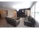 Living room featuring hardwood floors, a large TV, and comfortable seating at 4416 Walker Hallow St, Raleigh, NC 27616