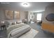 Relaxing primary bedroom featuring a stylish bed, coordinating decor, and plenty of space at 4416 Walker Hallow St, Raleigh, NC 27616