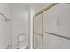Modern bathroom with a glass shower and toilet at 4622 Ludwell Branch Ct, Raleigh, NC 27612