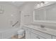Bathroom featuring a bathtub, vanity, and updated fixtures at 4622 Ludwell Branch Ct, Raleigh, NC 27612